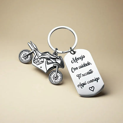 Stainless steel minimalist motorcycle keychain in a flannel gift bag.
