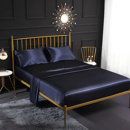 Ice silk bed sheet set in royal blue showing satin weave texture and reinforced corner stitching