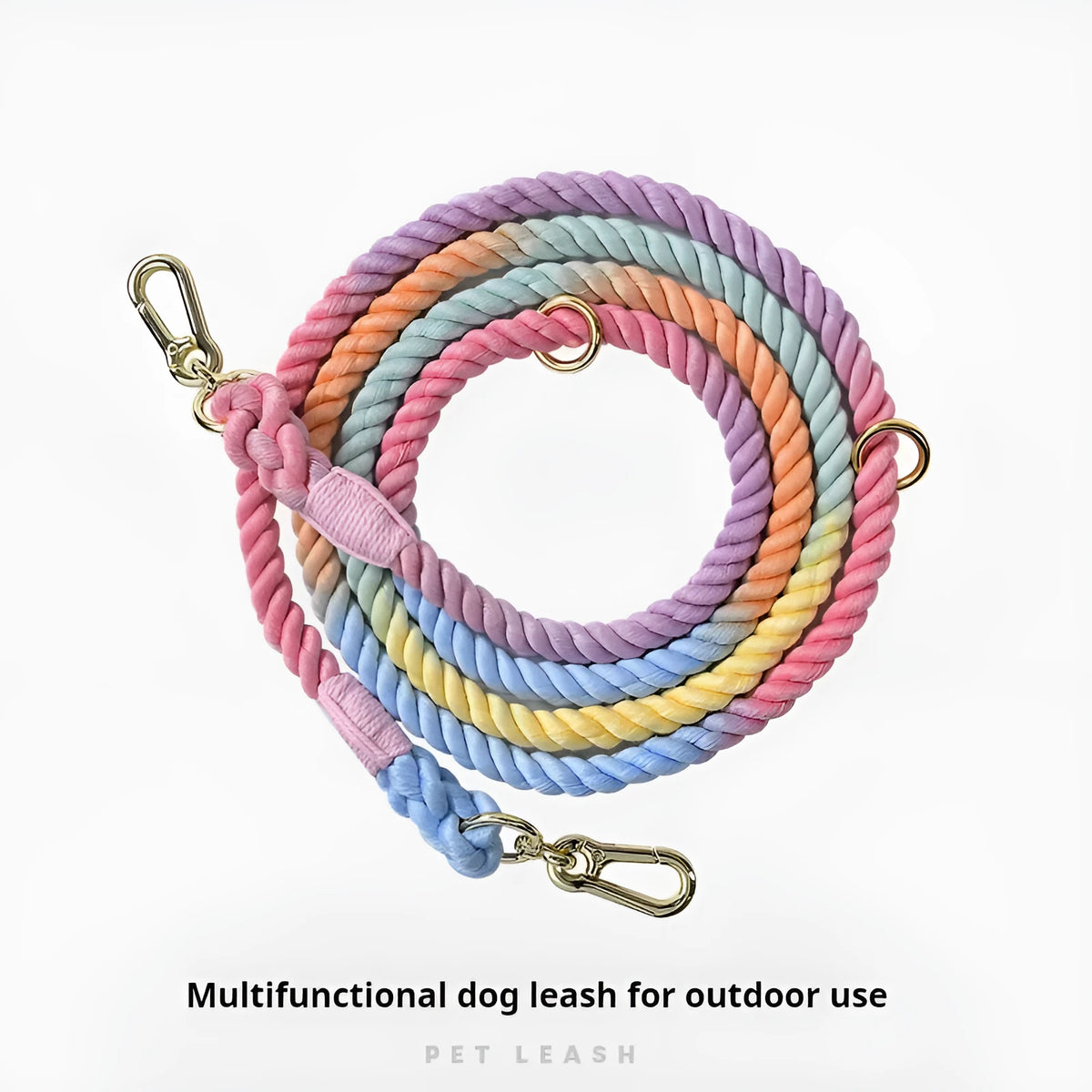 Woven rainbow pattern dog leash with double grip handles and a metal clasp.
