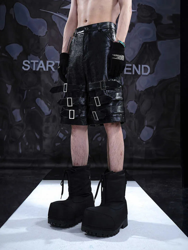 Men's black PU leather cropped pants with medium low waist, made from 100% polycarbaminate fibre, showing front view