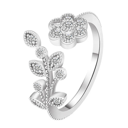 Women's copper open ring with diamond-treated flower and leaf design in gold colour.