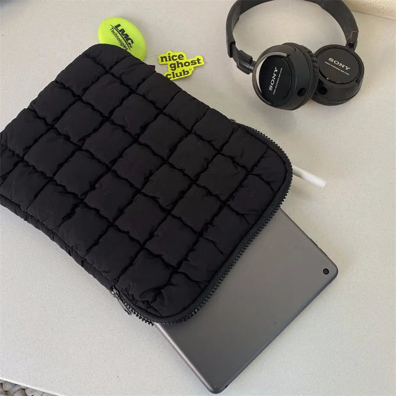 Black and white large capacity nylon laptop bag for 11, 14, and 15.6 inch computers.