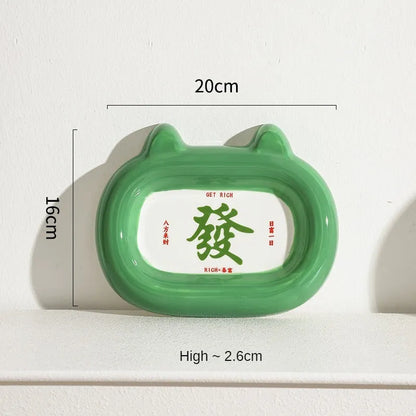 Handcrafted ceramic pet bowl with an animal design, for cat or dog food and water.