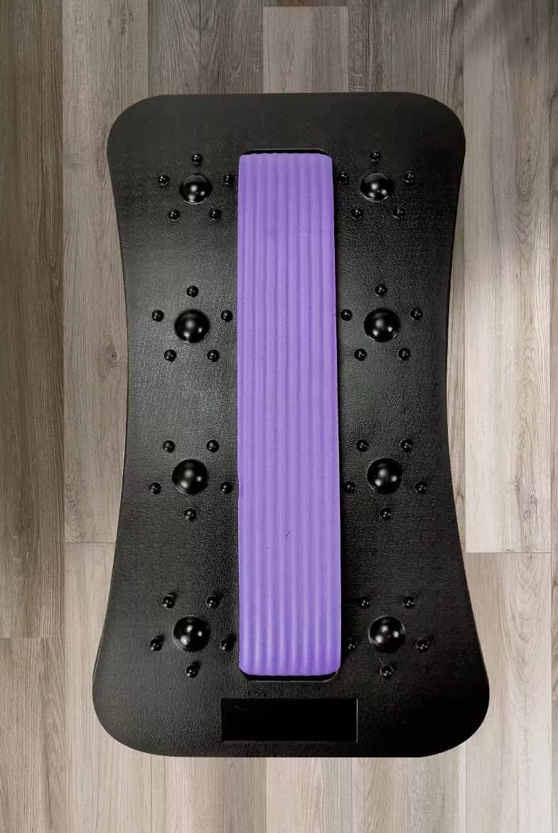 Lumbar Tractor Stretcher in black with acupressure points for back relief