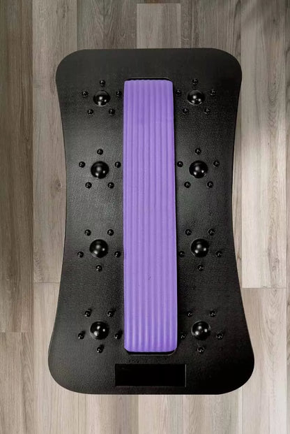 Lumbar Tractor Stretcher in black with acupressure points for back relief