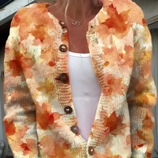 Yellow women's cardigan coat with a raised 3D digital print pattern, shown on a hanger.