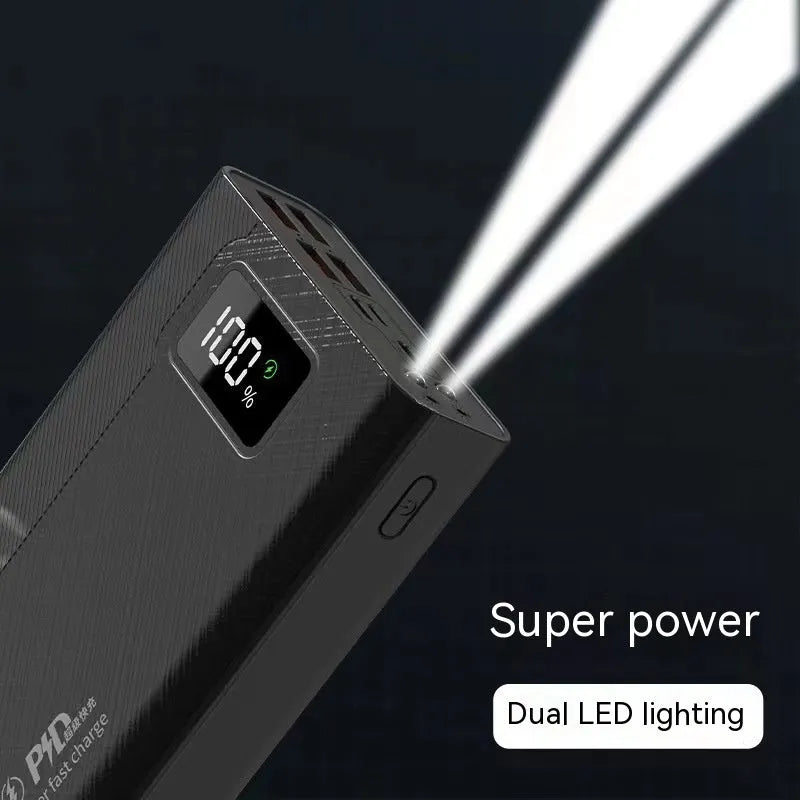 Black or white large capacity power bank showing its portable size and charging port.