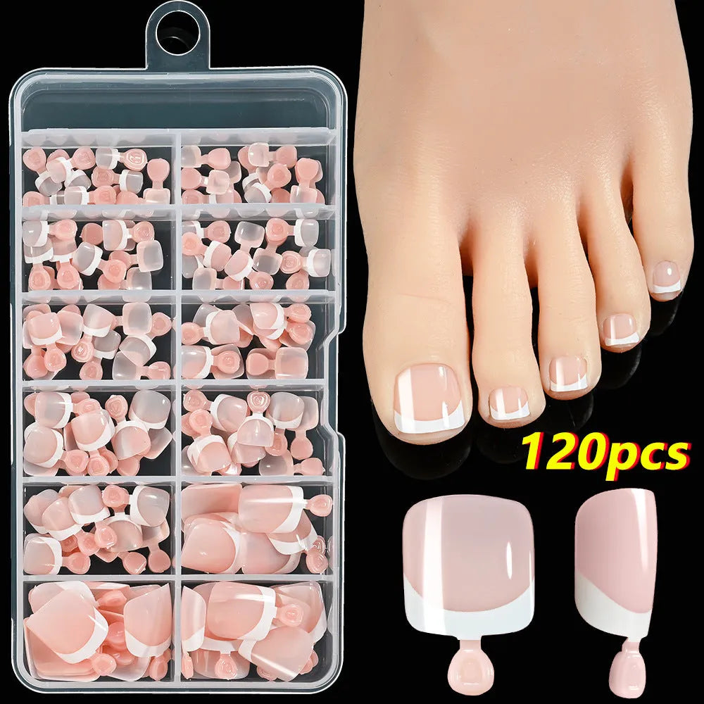 Box of 120 full square short artificial nail tips with French white edges in multiple nude shades.