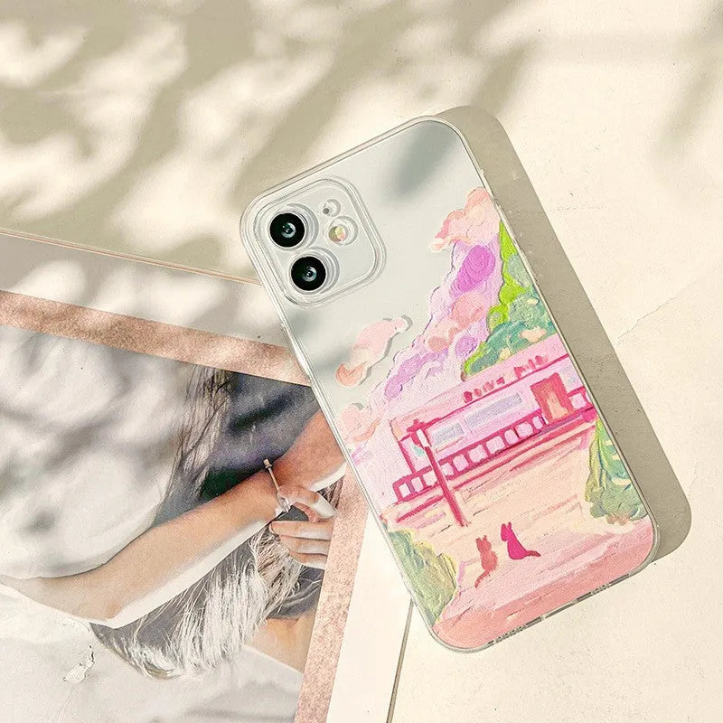 Soft silicone iPhone case with two-cat cartoon design on a mobile phone