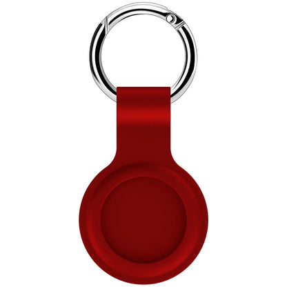Black waterproof silicone Airtag protective case with metal keychain clip, shown next to colour options.