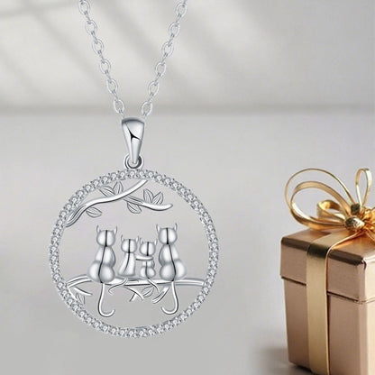 Copper necklace with a four kitten pendant on a cross chain, length 50 cm.