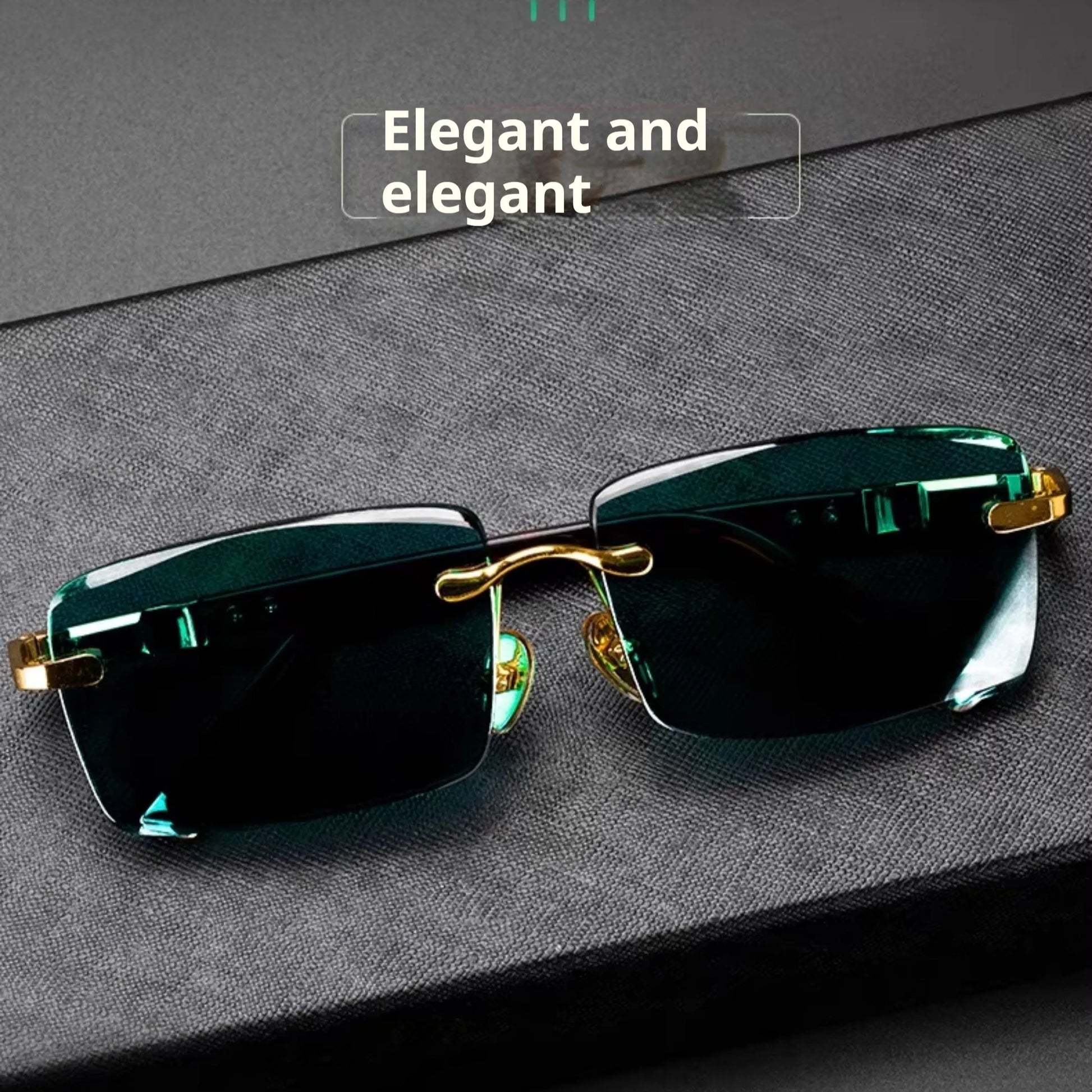 Dark green frameless crystal glasses with sunshade lenses, case, and cloth