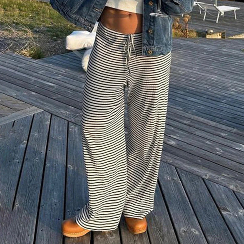 Stylish women's striped pants in various colors with a casual, Y2K-inspired design