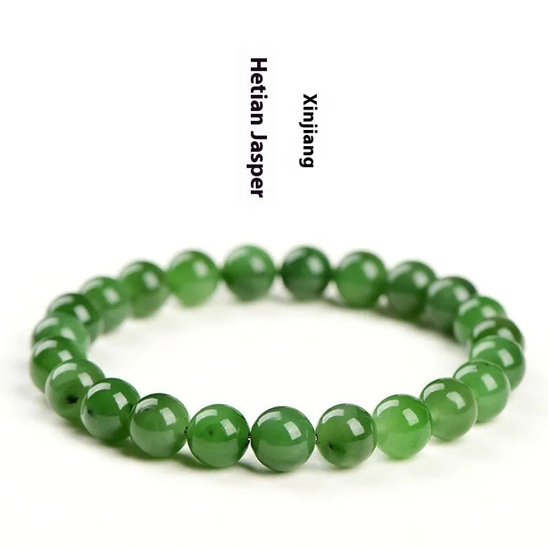Natural jasper ball bracelet with polished Hetian jade beads in multiple sizes from 4mm to 12mm on wrist