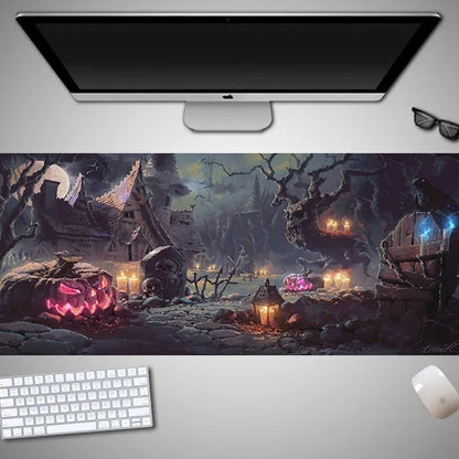 Halloween-themed oversized cloth mouse pad with non-slip rubber base on a wooden desk.