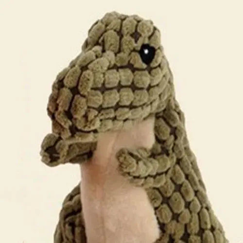 Durable grey, green, and orange dog toy with sound for biting and boredom relief.