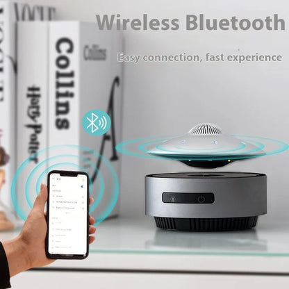 Automatic lifting magnetic levitation Bluetooth speaker in automatic lifting audio colour, showing floating rotating unit.