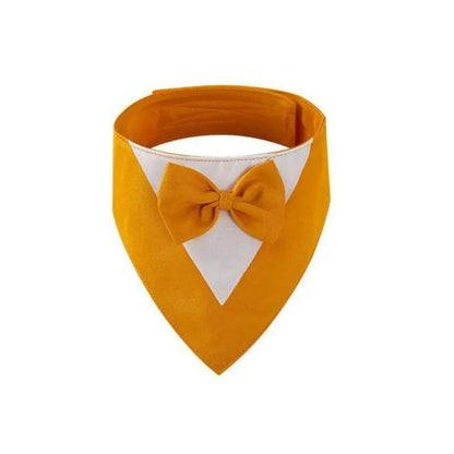 Triangle-shaped pet bib scarf with a bow, shown in a bright colour, displaying the soft fabric and absorbent towelling lining.