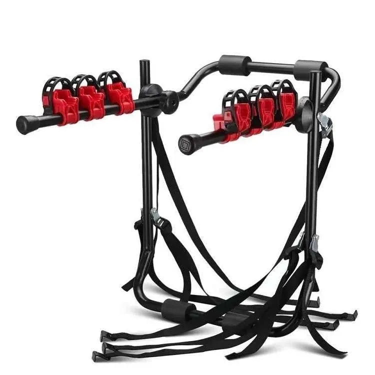 Black and red trunk mounted car bike holder rack with adjustable fastening system on vehicle boot