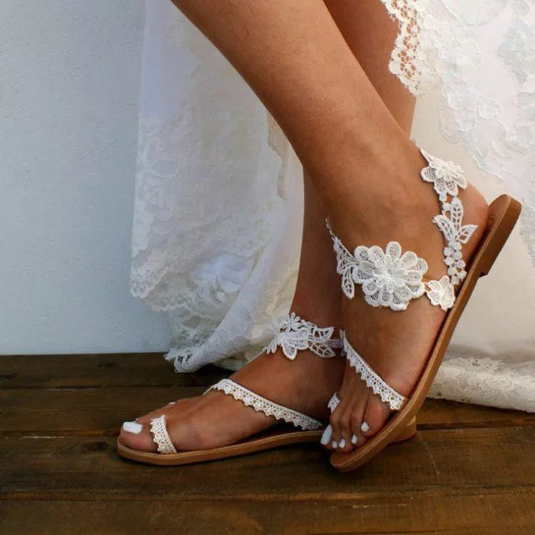 Bohemian lace sandals with floral ankle strap in white and black
