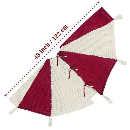 Red and white knitted Christmas tree skirt measuring 122cm square with tassel decoration