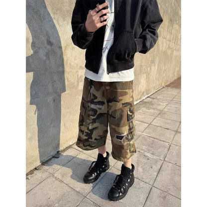 Men's camouflage cropped jeans with ripped patches and straight-leg fit, size range S-3XL