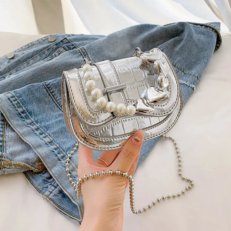 Laser Pearl Tote Saddle Girl Mini crossbody bag in black with sandwich pocket design and adjustable strap