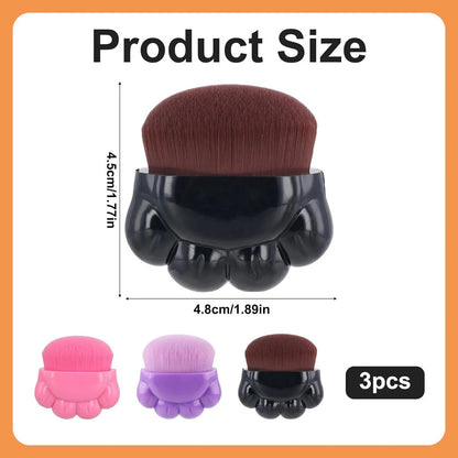 Three small paw-print shaped pet balm brushes with soft heads in plastic storage boxes
