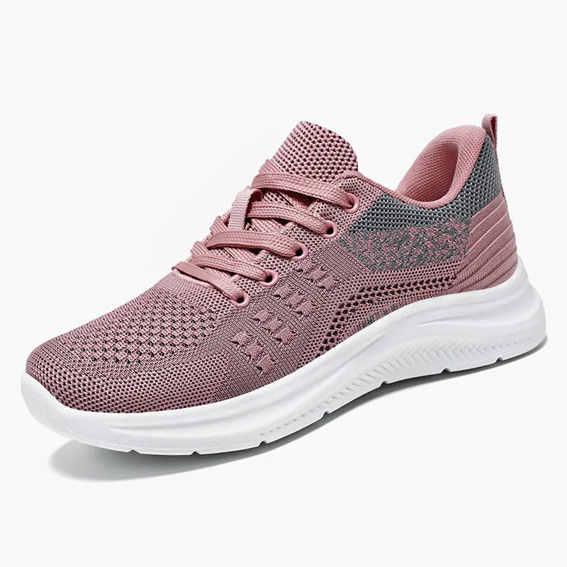 Women's black mesh sneakers with round toe and lace-up design showing breathable construction