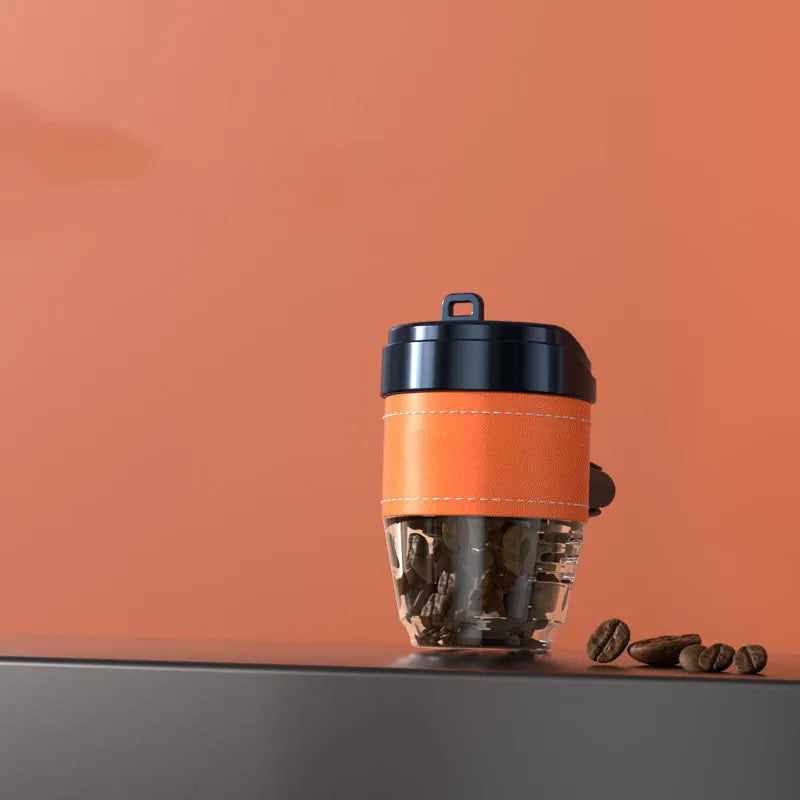 Brown plastic coffee cup-shaped solid car air freshener for dashboard odour removal.