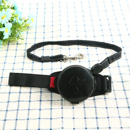 Automatic retractable dog leash extended to 3 metres with a lock button, shown in vibrant orange.