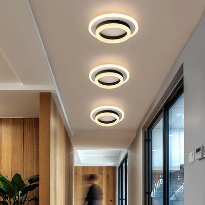 Modern LED corridor ceiling light in black round design with tri-colour adjustable lighting for hallways and entrances