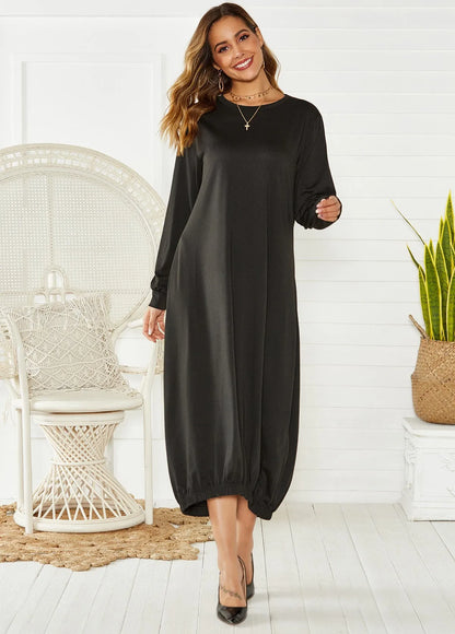 Black lantern dress with lace-up crew neck and loose fit, made from knitted polyester fabric