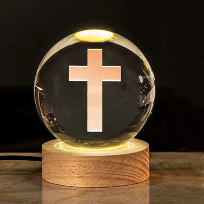 White crystal ball ornament with solid wood warm light base, showing purity engravings like Cross and Maria for desk decor