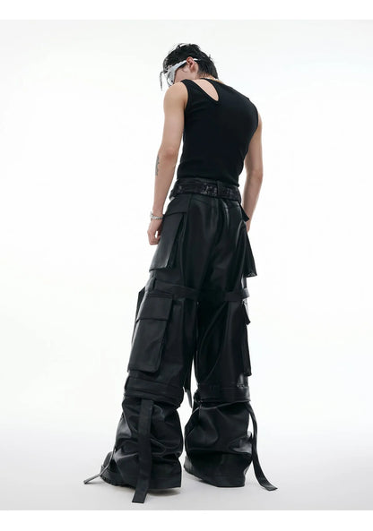 Black loose-fit trousers with quilted texture, multiple pockets, and stitching ribbon leather accents on model