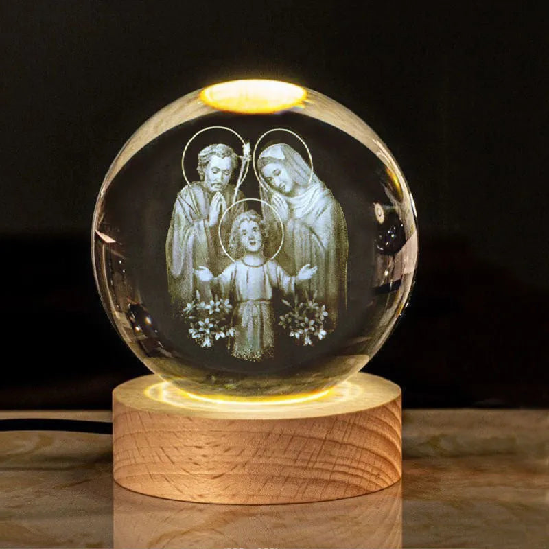 White crystal ball ornament with solid wood warm light base, showing purity engravings like Cross and Maria for desk decor