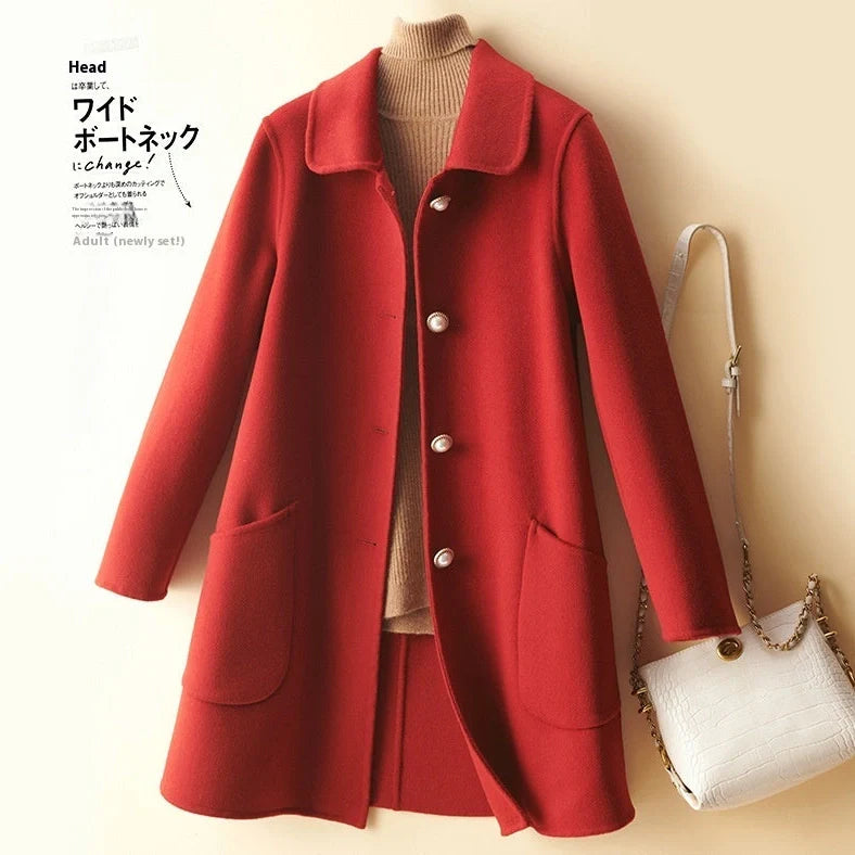 Women's black wool mid-length coat with doll collar and pearl buckle, showing double-faced fabric and 65cm length.