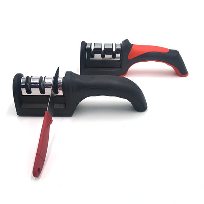 White plastic kitchen knife sharpener measuring 15cm long with special stone sharpening element