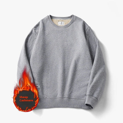 Cozy fleece pullover in a variety of classic colors, featuring a warm and soft fabric blend, stylish round neck design, and comfortable long sleeves.