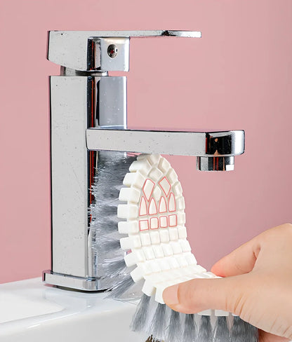 White flexible plastic bathroom tile cleaning brush measuring 15.5cm long