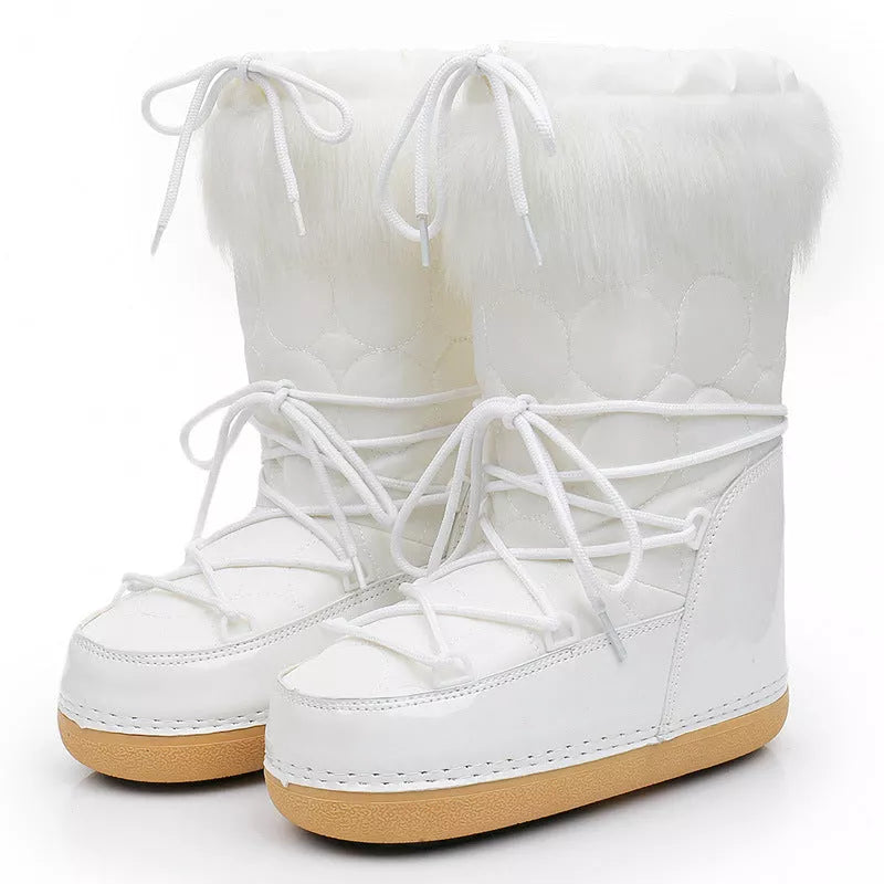 Women's white fleece-lined winter space boots with mid-top design and round toe