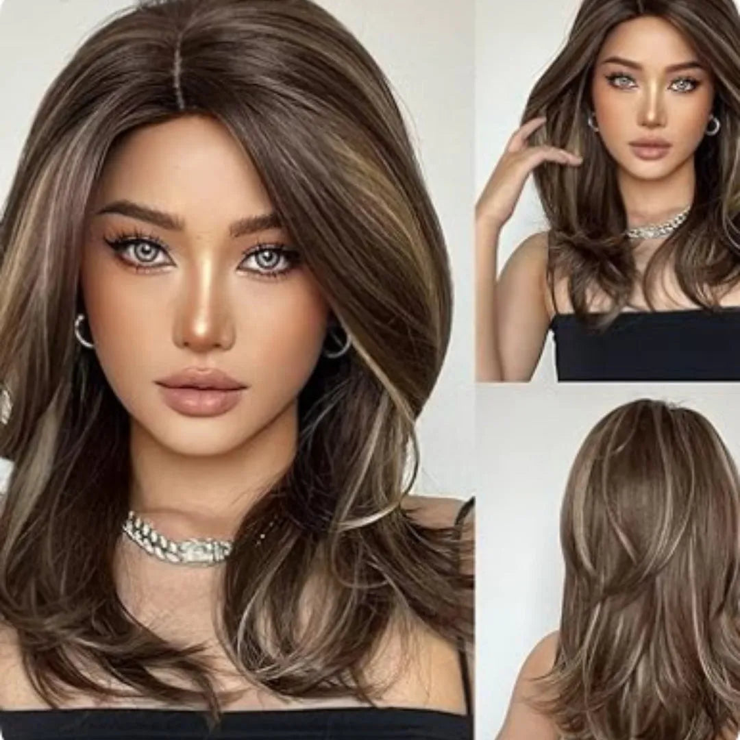Mid-length curly synthetic wig with long bangs in a platinum gradient colour, shown on a wig stand.