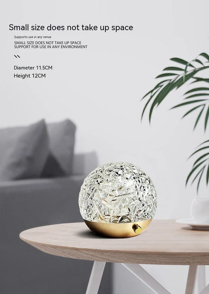 Spherical water ripple projector night light with touch controls creating colourful aurora patterns on wall