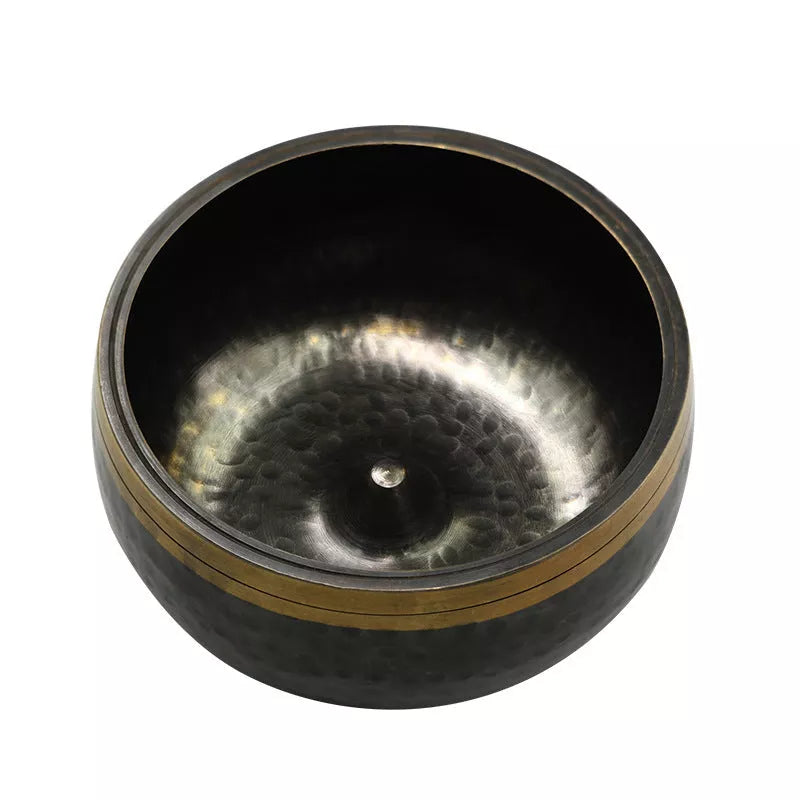 Black and gold copper meditation sound bowl with leather rod and thin pad