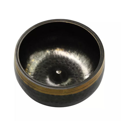 Black and gold copper meditation sound bowl with leather rod and thin pad