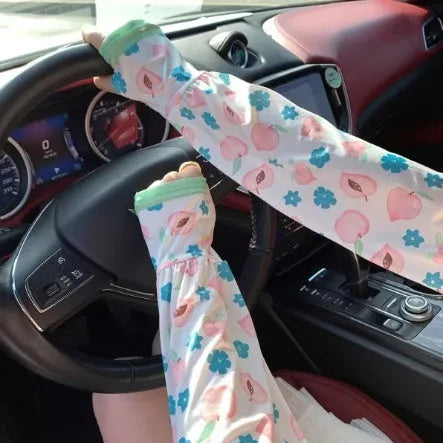 UV protection ice silk oversleeves in floral pattern covering forearm and elbow