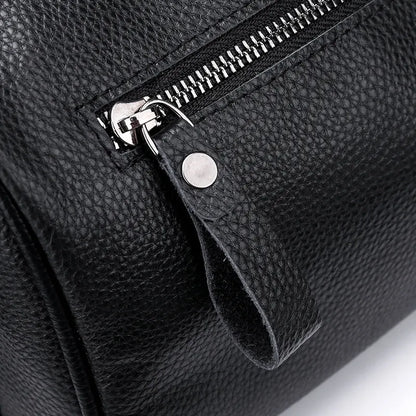 Black genuine leather one-shoulder crossbody bag with dimensions 24cm wide by 16cm high.