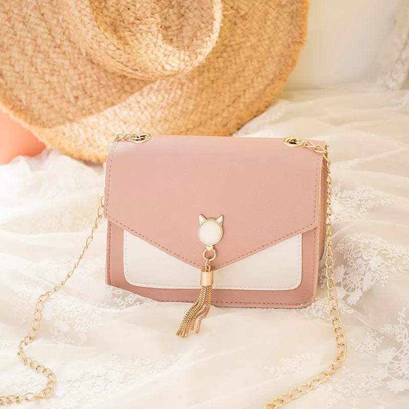 Small square messenger bag with cat tassel decoration and adjustable chain strap