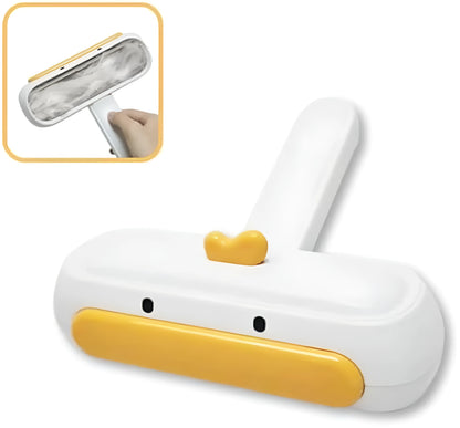 Portable pet hair remover with yellow duck design, showing polyester bristles and compact 15 cm size for removing fur
