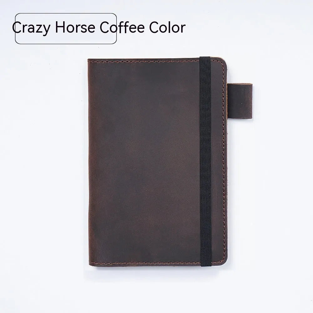 Handmade cowhide kraft notebook open showing wood-free paper, in dark green colour